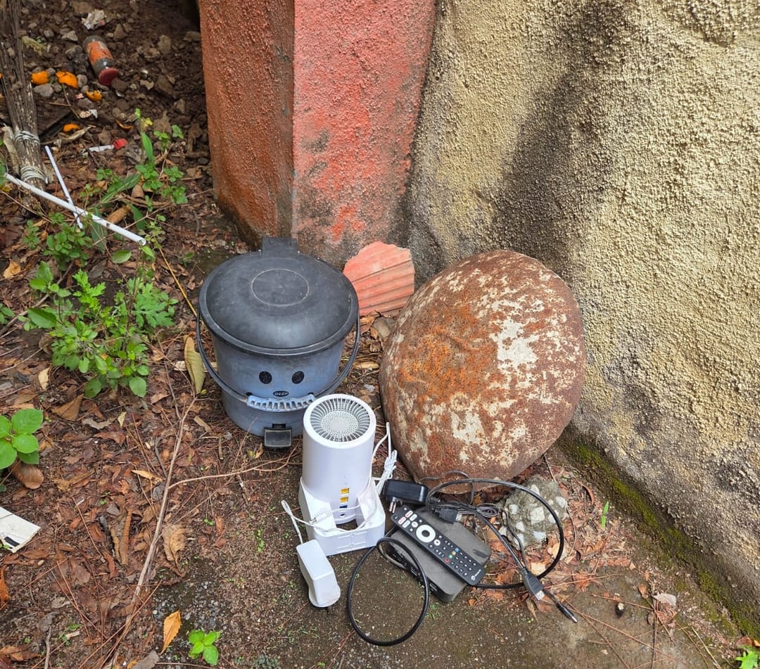 Airtel router, set-top box, remote, adapters and cable disconnected and kept aside for collection